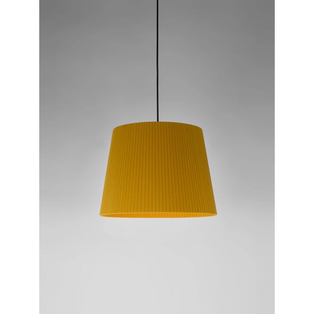Mustard sísísí cónicas gt3 pendant lamp by santa & cole. Dimensions: d 36 x h 27 cm materials: metal, ribbon. Available in...