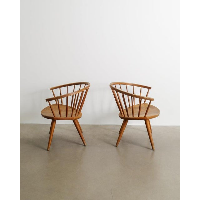 A rare pair swedish sculptural mid century "arka" wooden armchairs in curved stained solid oak by yngve ekström produced...