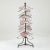 A vintage metal plate holder, an ‘etagere’ in the brasserie style. With a dazzling configuration of twisted wire plate...