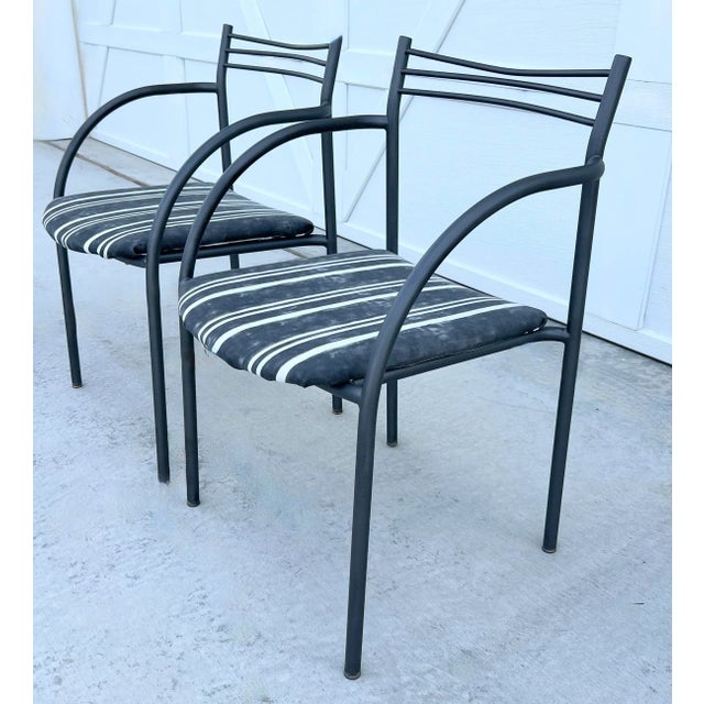Pair of smart-looking Mid-Century outdoor chairs by Shelby Williams Industries. The chairs have sloped modern lines and...
