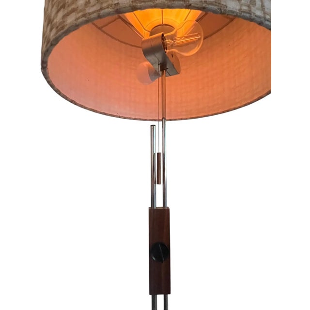 Vintage height adjustable floor lamp from the 1960s, manufactured by the German/Swiss company Temde. It impresses with its...