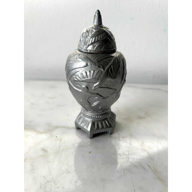 1920s French Art Deco incense burner produced by Vantines, measuring 5.5" tall and 3" at its widest point. Crafted from...