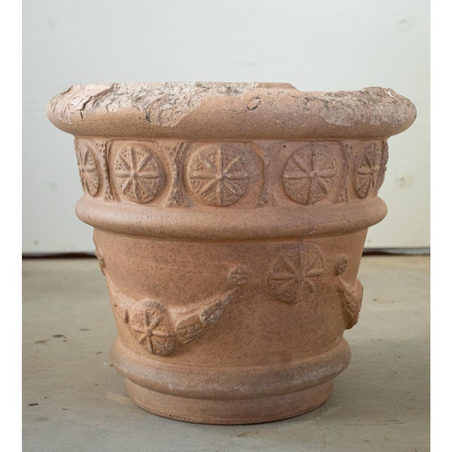 Elevate your garden or interior space with this exquisite pair of 19th-century terracotta planters, expertly crafted in...