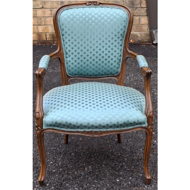 A Mid 20th Century Provincial Carved Walnut and Re Upholstered Fauteuil. Very clean. No stain or tear. Measures 26" in...