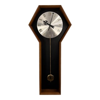 Arthur Umanoff for Howard Miller #557 Coffin Pendulum Wall Clock For Sale