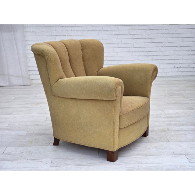 1960s, Danish relax chair. Original light green furniture wool, beech wood legs, brass springs in the seat. Original good...