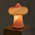 A 1970s Italian Murano glass table lamp by Vetri, mouth-blown in swirling ribbons of blush pink and milky white. The...