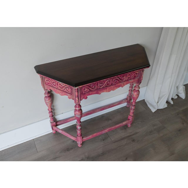 Bring warmth, character, and style into your home with this beautifully refinished antique console table. Showcasing an...