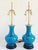 Stunning pair of Century Modern Cerulean blue gourde form porcelain table lamps, with ebonized bases and polished brass...