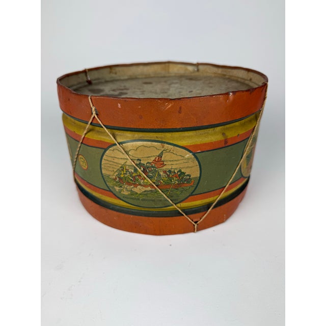 An authentic vintage J. Chein & Co. patriotic tin lithograph toy drum featuring beautifully illustrated scenes from...