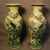 An exceptional pair of Chinese biscuit porcelain vases decorated with exotic birds and peonies on a yellow ground. Nice...