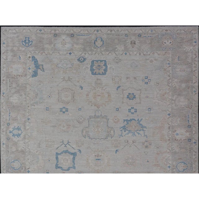 Modern Tribal Oushak With Light Taupe Colored Border and Off White Background For Sale - Image 9 of 13