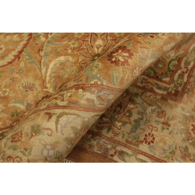 Designed with mesmerizing intricacy and gorgeous color palette, this hand-knotted masterpiece demonstrates the beauty and...