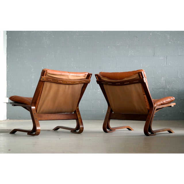 Pair of MidCentury Norwegian Easy Chairs in Cognac Leather by Oddvin