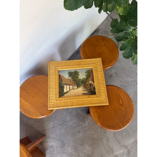Antique small oil painting on wood depicting several thatched cottages, signed J. Poy, from the first half of the 20th...