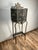 This is a truly striking example of a Gothic Revival telephone stand, attributed to the circle of Oscar Bach or Bertram...