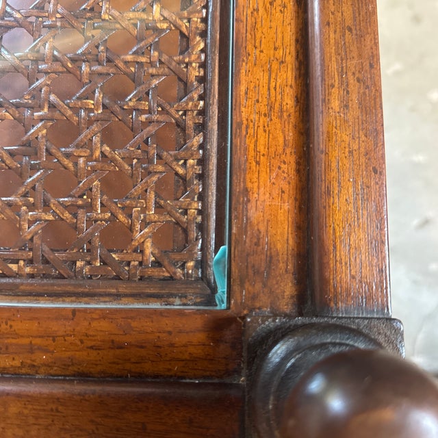 • An exceptional two-tier square end table by Thomasville Furniture Industries, circa 1974. This timeless transitional...