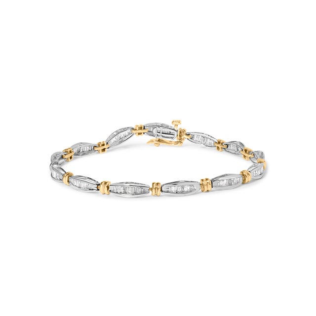 Immerse yourself in the decadence of the 10K Two-Tone Gold Diamond Bracelet, where expert craftsmanship meets timeless...