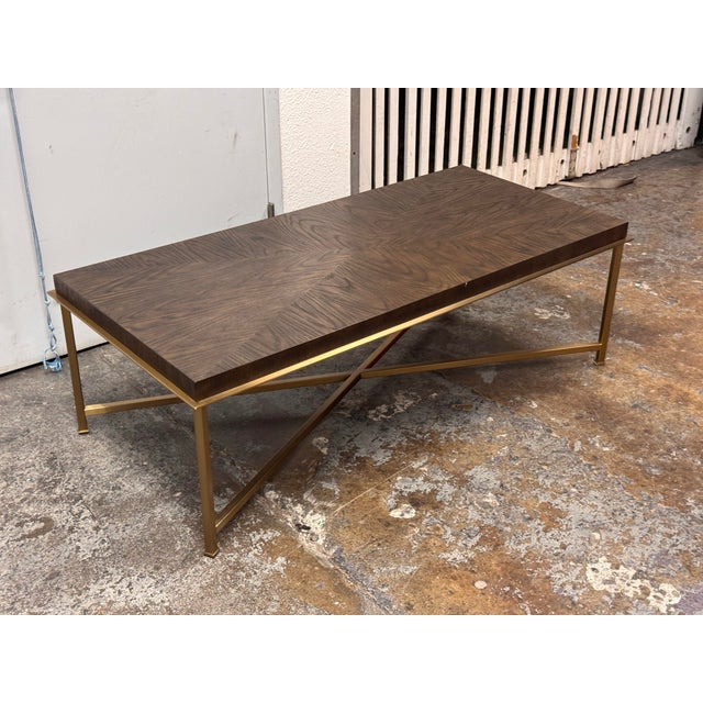 Design Plus Gallery presents the Axel Coffee Table from Bassett Furniture. The rectangular wood-grain veneer tabletop...