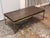 Design Plus Gallery presents the Axel Coffee Table from Bassett Furniture. The rectangular wood-grain veneer tabletop...