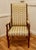 A fine quality regency style high back upholstered arm chair. This is a superbly comfortable Edwardian Walnut armchair, it...