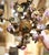 Metal Early 20th C. French Four-Light Floral Tole Chandelier With Porcelain Flowers For Sale - Image 7 of 10