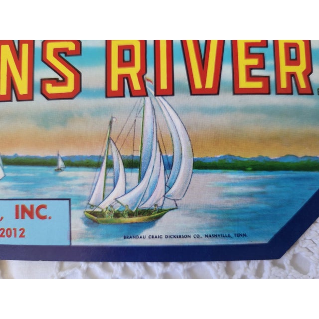 A Pride of St Johns River produce crate label, made for Snyder-Mew Co, in Crescent City, Florida. Printed in Nashville,...