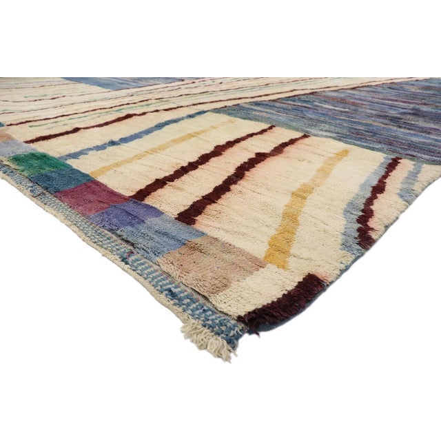 21121 Oversized Berber Abstract Moroccan Rug 15'03 x 17'00. Showcasing a bold expressive design, incredible detail and...
