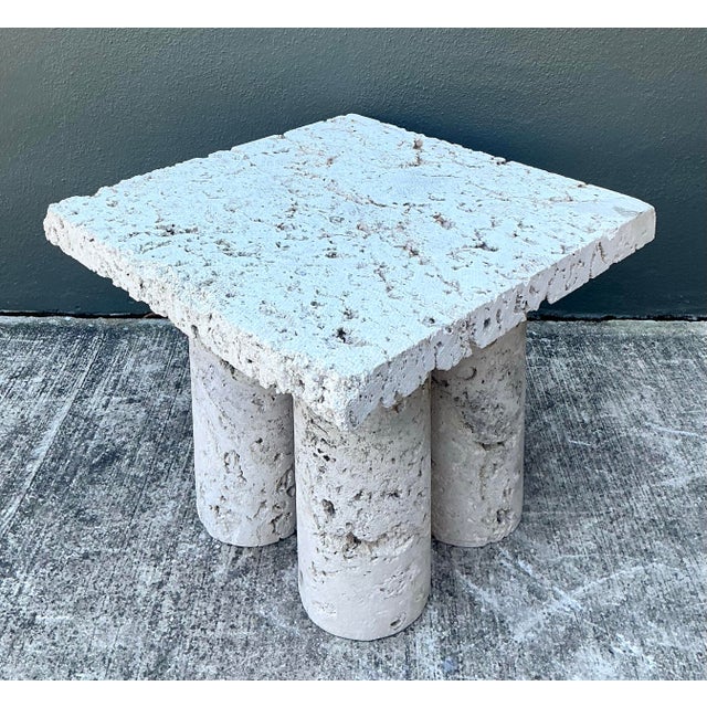 This exceptional vintage side table is a masterclass in Organic Modernism, expertly crafted from genuine coquina stone....