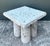 This exceptional vintage side table is a masterclass in Organic Modernism, expertly crafted from genuine coquina stone....