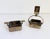 A rare brass and crystal smoking set, including a matchbox holder and ashtray unit, designed to work alongside the resting...