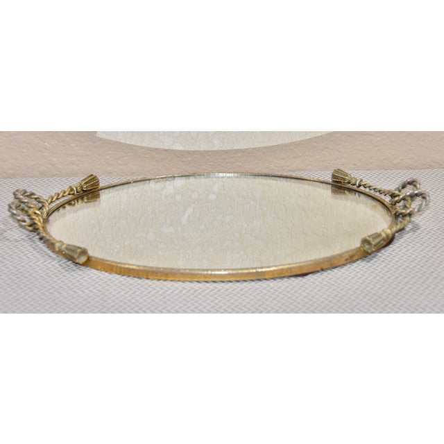 Elevate your vanity collection with this Vintage Vanity Mirror Tray, embodying the elegance of Hollywood Regency design....