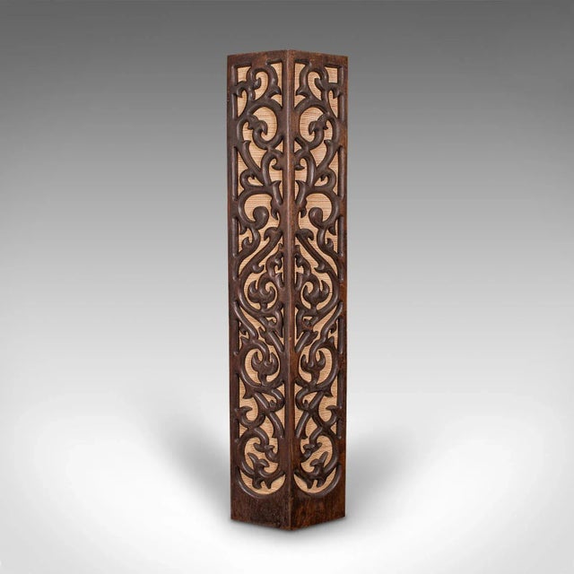 This is a vintage hexagonal stand. An Oriental, mahogany and rattan decorative podium or plant stand, dating to the mid...