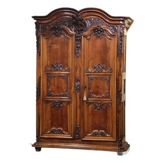 18th Century French Louis XV Carved Walnut Armoire From Lyon For Sale