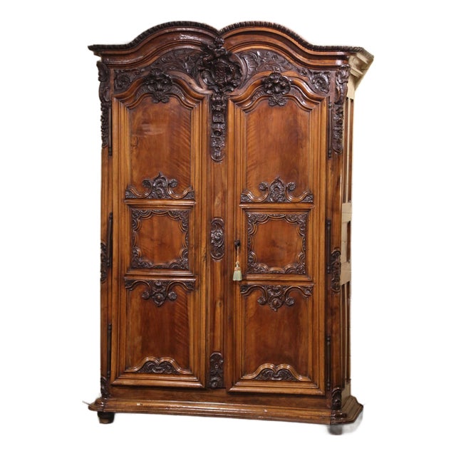 18th Century French Louis XV Carved Walnut Armoire From Lyon For Sale