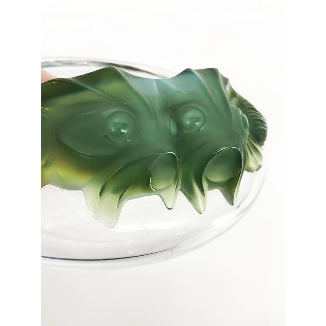 The Lalique Crystal Centerpiece Bowl in the Yeso Antinea Koi Fish design is a breathtaking fusion of artistry and luxury....