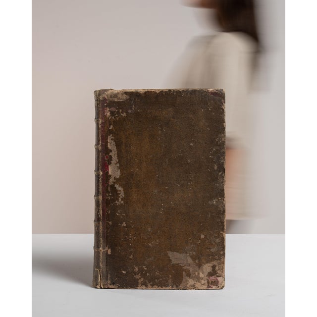 This early 20th century book from France is finished in chocolate, worked in wood. Its form follows honest, well-...
