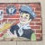 Hand-Painted Advertising Tin Sign by Aqui, 1920s For Sale - Image 3 of 6