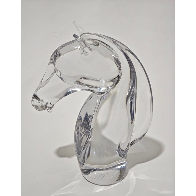 MAESTRO BALLARIN. Made in Murano, Italy, circa 1980. Clear Murano glass sculpture depicting a horse's head. Signature at...