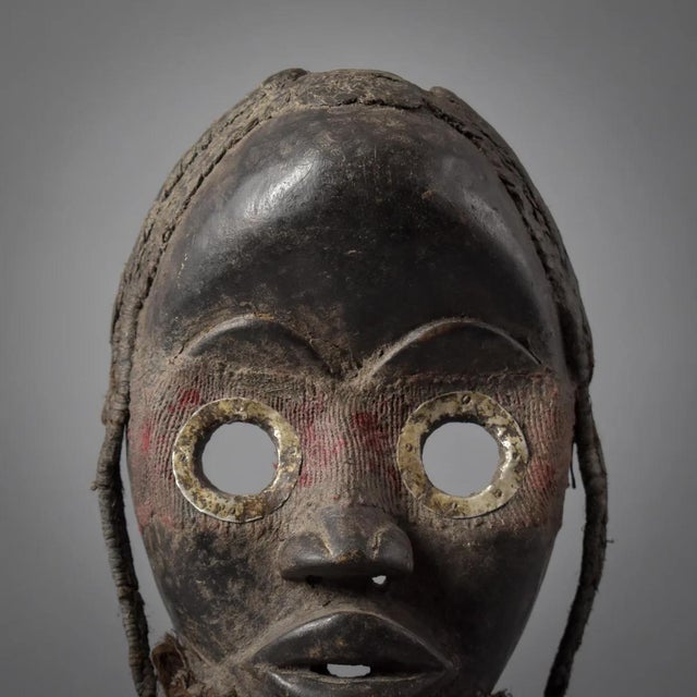 Dan masks, originating from the Dan people of Liberia, CÃ´te d'Ivoire, and Guinea, are recognized for their elongated...