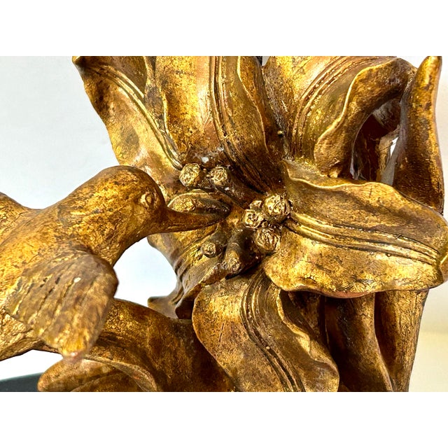 This pair of MCM bookends feature a sculpture of hummingbirds sipping nectar from a blooming flower. Finished in an...