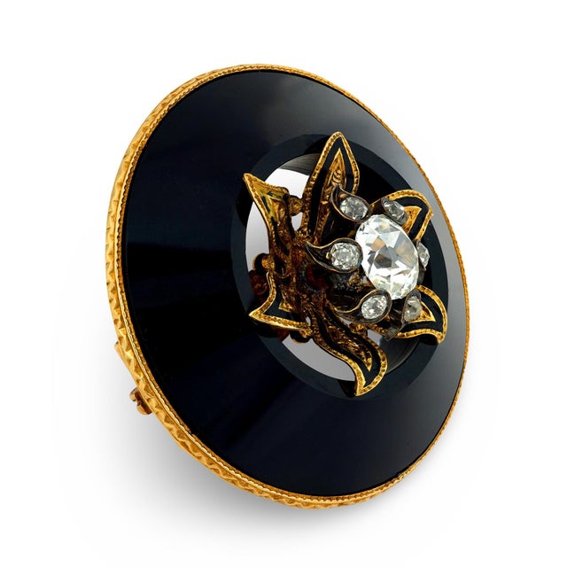 This powerful and evocative Victorian mourning brooch is a deeply symbolic jewel, reflecting the solemn beauty and...