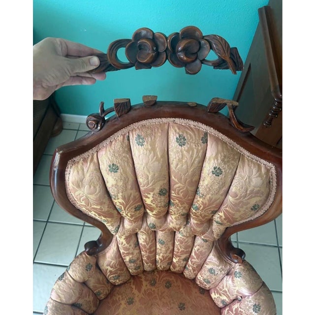 Exceptional mid-19th century Rococo Revival armchair, circa 1850–1870, featuring an ornate carved wood frame, serpentine...