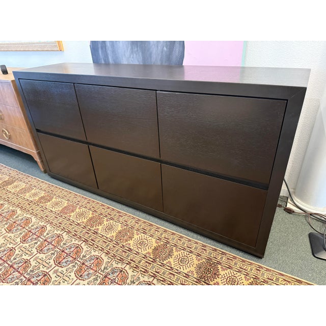 Design Plus Gallery presents a Contemporary Six Drawer Dresser + Credenza. Clean lined silhouette houses six deep...