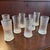 This set of eight vintage drinking glasses features the iconic "Ultima Thule" pattern designed by Tapio Wirkkala for...