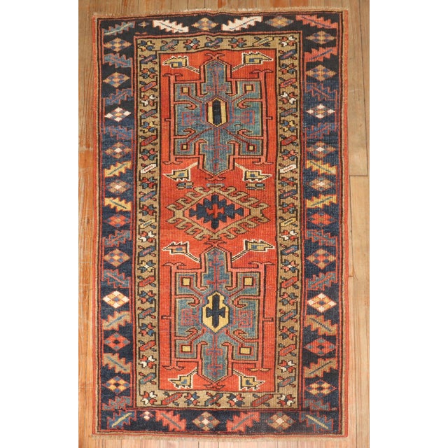 An early 20th-century Persian heriz small geometric rug. Measures: 2'8'' x 4'6'' Heriz carpets are beloved for their...