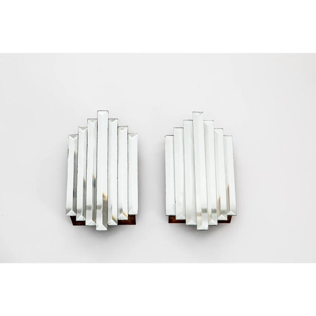Prismatic Art Deco-style mirror sconces sourced from Marburger Farm Antique Show in Round Top, Texas. Not wired for lighting.