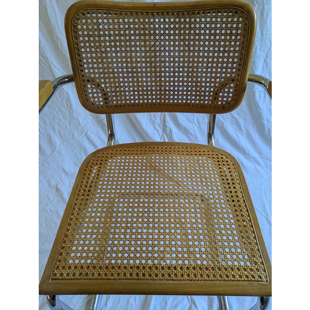 Mid-Century modern cane and chrome cantilevered Cesca arm chairs attributed to Marcel Breuer.