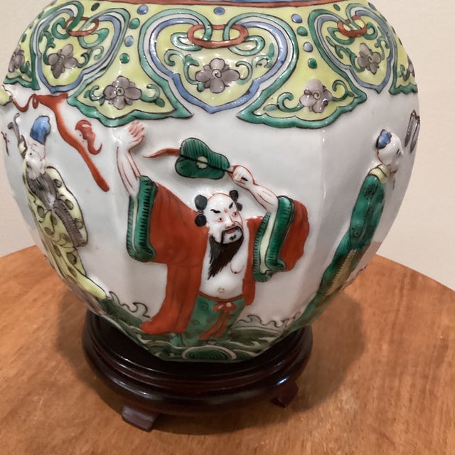 Late 19th Century Antique Chinese Porcelain Ginger Jar With Molded Raised Eight Immortals on Wood Base For Sale - Image 5 of 12
