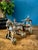 A striking antique cast metal horse-drawn carriage sculpture dating to the early 20th century, circa 1900–1940. This...